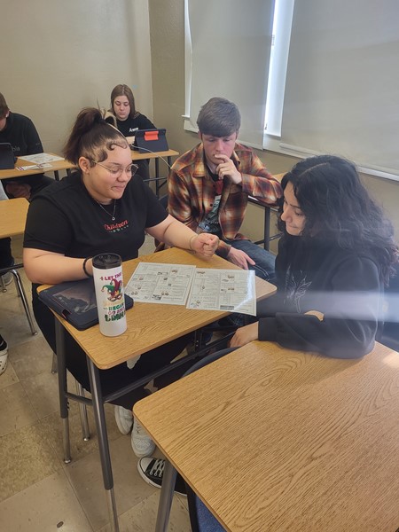Students in Ms. Green's Economics class played the BEAN GAME today.  They divided into family groups and worked together on trying to live on a "20 Bean Salary", which later was reduced to 13 beans due to a cut in job hours. Managing money means making choices. There is never enough money available for all of the things we’d like to have or do. This game helped them to decide what is important to them. Thank you to Career Coach Deana Reno for your help. 